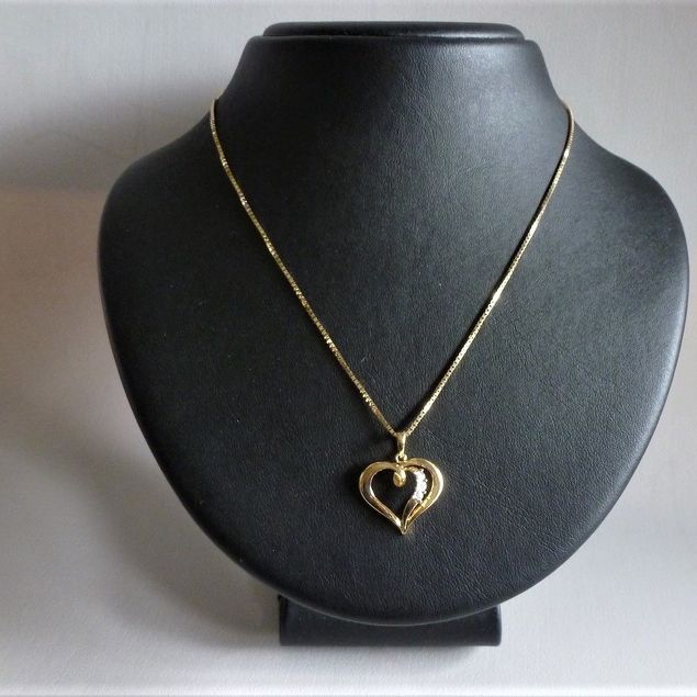 Gouden hartje met diamant	