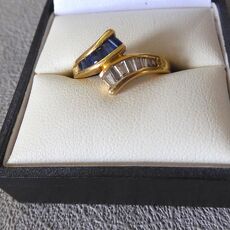 14 kr gouden ring met saffier en diamant