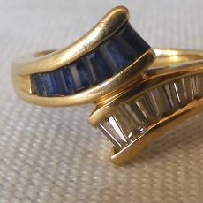 14 kr gouden ring met saffier en diamant