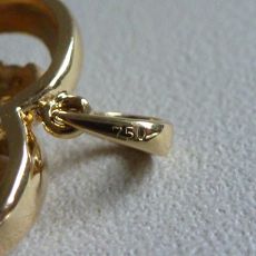 Gouden hartje met diamant	