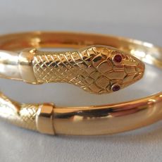 Gouden slangen -klemarmband	