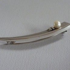 Nol Coopmans broche