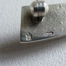 Nol Coopmans broche