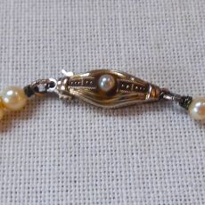Parelcollier met 14 kr gouden slot
