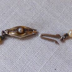 Parelcollier met 14 kr gouden slot