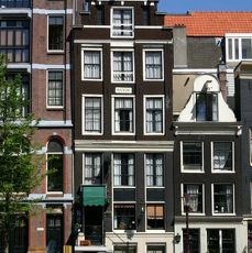 Zilveren miniaturen van grachtenpanden Herengracht Amsterdam